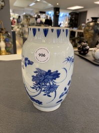A Chinese blue and white vase with floral design, Transitional period