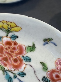 A pair of Chinese famille rose cups and saucers, Yongzheng