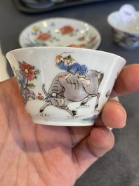 A pair of Chinese famille rose cups and saucers, Yongzheng