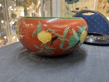 A Chinese relief-decorated alms bowl with wooden lid, Qianlong mark, 19/20th C.