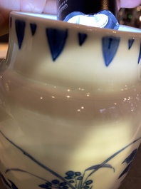 A Chinese blue and white vase with floral design, Transitional period