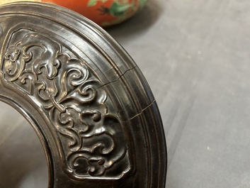 A Chinese relief-decorated alms bowl with wooden lid, Qianlong mark, 19/20th C.