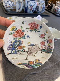A pair of Chinese famille rose cups and saucers, Yongzheng