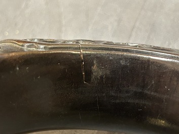 A Chinese relief-decorated alms bowl with wooden lid, Qianlong mark, 19/20th C.