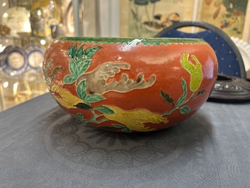 A Chinese relief-decorated alms bowl with wooden lid, Qianlong mark, 19/20th C.