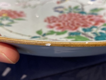 A Chinese famille rose dish with birds among fine blossoming branches, Yongzheng