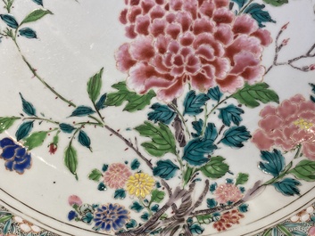 A Chinese famille rose dish with birds among fine blossoming branches, Yongzheng