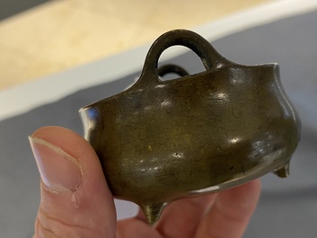 Three Chinese bronze censers and a silver-inlaid bronze vase, Qing