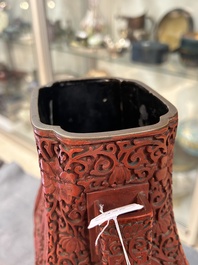 A Chinese red cinnabar lacquer 'fanghu' vase, 19/20th C.