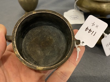 Three Chinese bronze censers and a silver-inlaid bronze vase, Qing