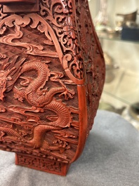 A Chinese red cinnabar lacquer 'fanghu' vase, 19/20th C.