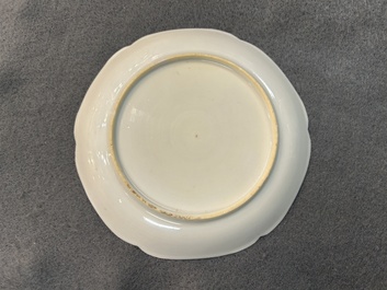 A Chinese grisaille and gilt 'roosters' cup and two saucers, Yongzheng