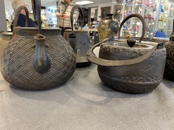 Six Japanese cast iron 'tetsubin' kettles, Meiji, 19/20th C.