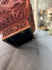 A Chinese red cinnabar lacquer 'fanghu' vase, 19/20th C.