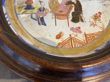 A large Chinese rose-Imari 'tea drinkers' dish, Yongzheng