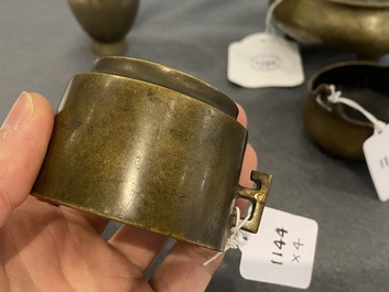 Three Chinese bronze censers and a silver-inlaid bronze vase, Qing