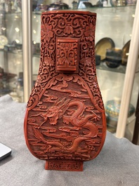A Chinese red cinnabar lacquer 'fanghu' vase, 19/20th C.