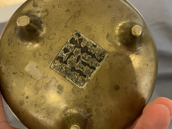 Three Chinese bronze censers and a silver-inlaid bronze vase, Qing