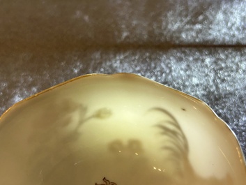 A Chinese grisaille and gilt 'roosters' cup and two saucers, Yongzheng