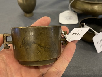 Three Chinese bronze censers and a silver-inlaid bronze vase, Qing