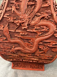 A Chinese red cinnabar lacquer 'fanghu' vase, 19/20th C.
