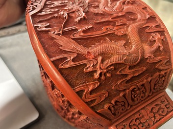 A Chinese red cinnabar lacquer 'fanghu' vase, 19/20th C.