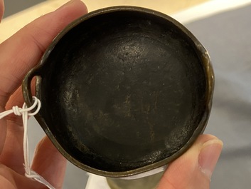 Three Chinese bronze censers and a silver-inlaid bronze vase, Qing