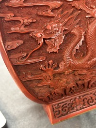 A Chinese red cinnabar lacquer 'fanghu' vase, 19/20th C.