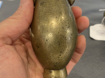 Three Chinese bronze censers and a silver-inlaid bronze vase, Qing