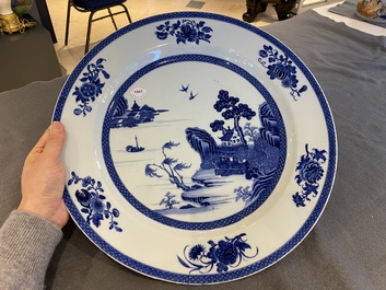 A large Chinese blue and white dish with a fine landscape, Qianlong