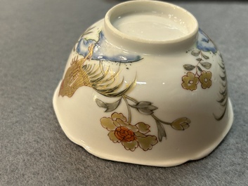A Chinese grisaille and gilt 'roosters' cup and two saucers, Yongzheng