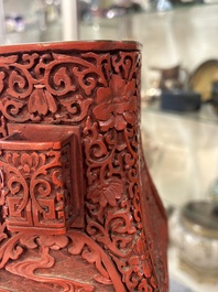 A Chinese red cinnabar lacquer 'fanghu' vase, 19/20th C.