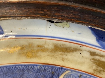 A large Chinese rose-Imari 'tea drinkers' dish, Yongzheng