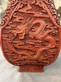 A Chinese red cinnabar lacquer 'fanghu' vase, 19/20th C.