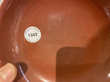 A Chinese monochrome copper-red plate, Zhong Guo Jing De Zhen Zhi 中國景德鎮製 mark, dated 1954