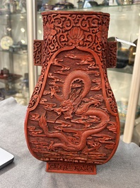 A Chinese red cinnabar lacquer 'fanghu' vase, 19/20th C.