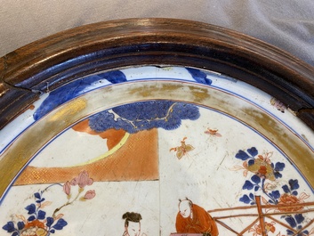 A large Chinese rose-Imari 'tea drinkers' dish, Yongzheng