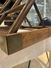 A Chinese foldable huali wooden book stand with brass mounts, Qing