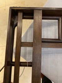 A Chinese foldable huali wooden book stand with brass mounts, Qing