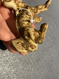 A small Chinese terracotta model of a mythical animal, mingqi, Han