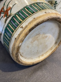 A pair of Chinese famille verte crackle-glazed vases, 19th C.