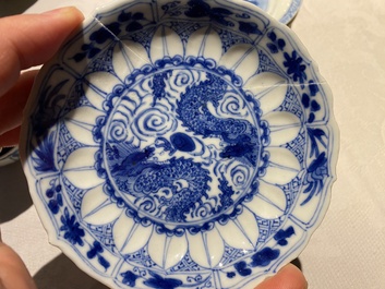 Eleven Chinese blue and white cups and ten saucers, Kangxi
