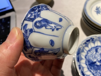 Eleven Chinese blue and white cups and ten saucers, Kangxi