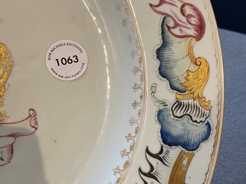 A Chinese famille rose armorial dish for the Dutch market with the arms of 'Tulleken', Qianlong