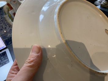 A Chinese famille rose armorial dish for the Dutch market with the arms of 'Tulleken', Qianlong