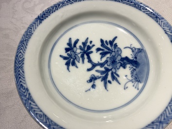 Eleven Chinese blue and white cups and ten saucers, Kangxi