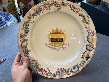 A Chinese famille rose armorial dish for the Dutch market with the arms of 'Tulleken', Qianlong