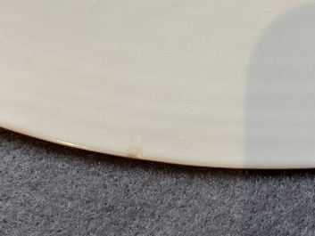 A Chinese famille rose armorial dish for the Dutch market with the arms of 'Tulleken', Qianlong