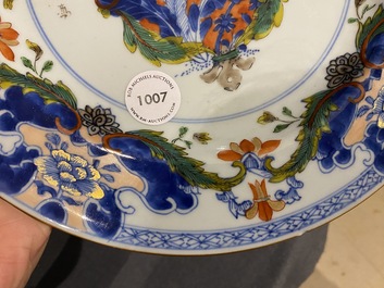 A rare Dutch-decorated Chinese blue and white armorial dish, Yongzheng