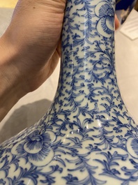 Three Chinese blue and white, crackle-glazed and powder-blue vases, 19th C.